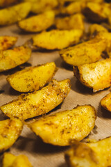 Baked potatoes in the oven close-up