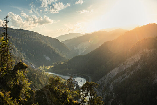 River in valley at sunset