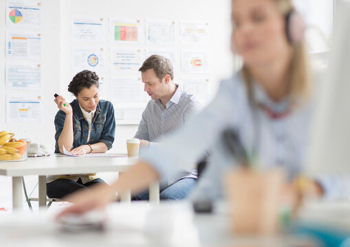 Workers in meeting in creative office