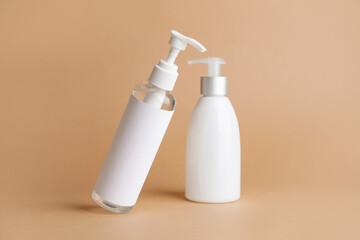 Different bottles of cosmetic products on color background