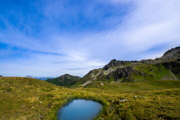Fototapeta na wymiar landscape with lake and blue sky in the mountains (Montafon, Vorarlberg, Austria)