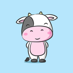 The cute cow with the big head is standing and smiling