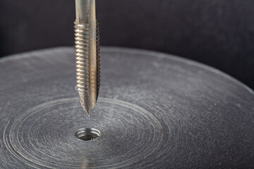 Thread tap. Tap drill steel billet. Working cutter.