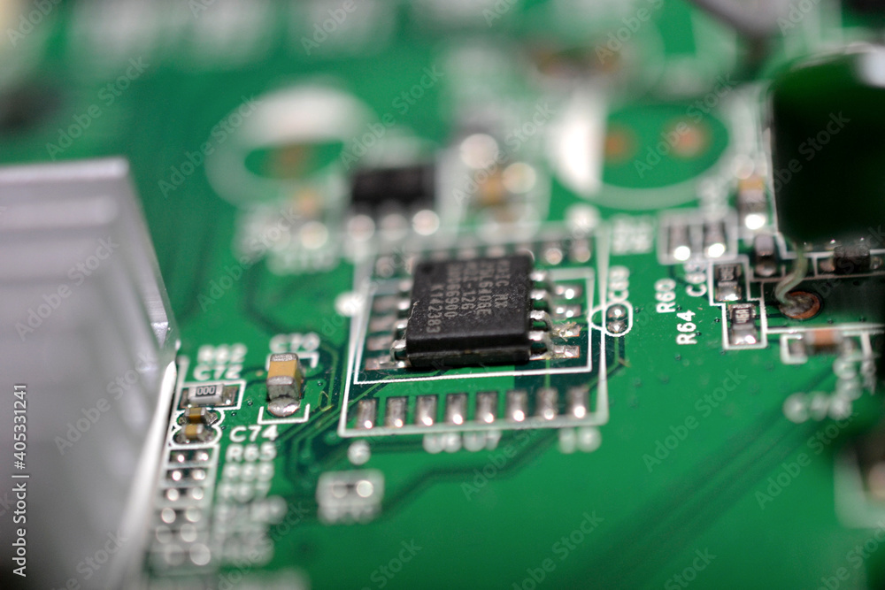 Poster selective focus closeup of a green computer circuit board