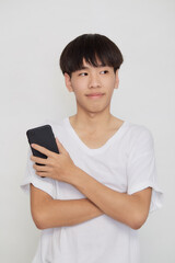 Fototapeta premium Asian Man holding of mobile phone