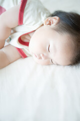 Obraz na płótnie Canvas 眠る赤ちゃん
