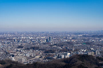 Fototapeta na wymiar City scape of West Tokyo seen from Mt. Takao