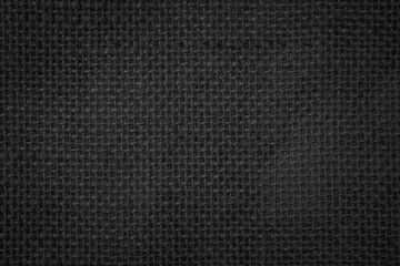 Jute hessian sackcloth canvas woven texture pattern background in light black color blank empty.