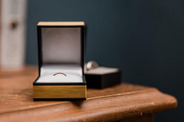 Wedding rings in groom's room before the wedding