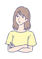 腕組みをして困っている女性
