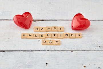HAPPY Valentine's day text on white wood