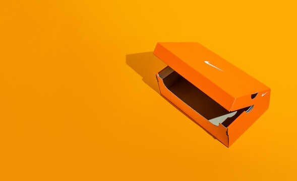 Kiev, Ukraine - January 16, 2021: Empty orange box, open. Nike shoe box