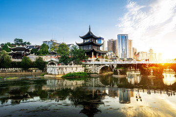 Fototapeta na wymiar Guiyang, China skyline at Jiaxiu Pavilion on the Nanming River. Translation: