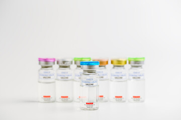 Ampoules with Covid-19 vaccine or Corona Virus 2019-ncov for injection on medical pharmaceutical. Coronavirus cure manufacture.