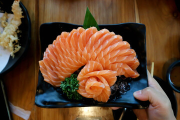 raw salmon or sliced salmon, salmon sashimi
