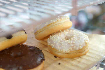 Donuts on display in a cafe