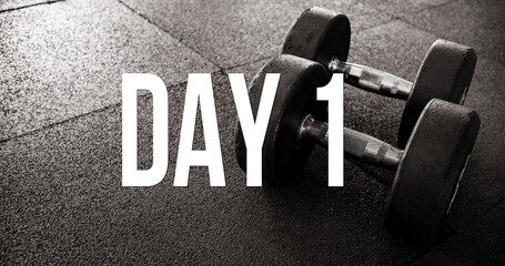 A rusty olympic size barbell loaded with plates on rubber mattin