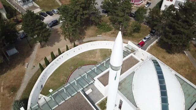 An aerial shot of the Bijela zamija surrounded by trees in Brcko, Bosnia and Herzegovina shot in HD