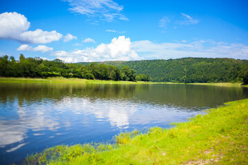Beautiful view over the river Dniester on a sunny summer's day. Outdoor recreation. Fishing adventures, carp fishing. Swimming, summer vacation, outdoor activities, place for picnic.
