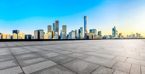 Empty square floor and modern city commercial buildings in Beijing,China.