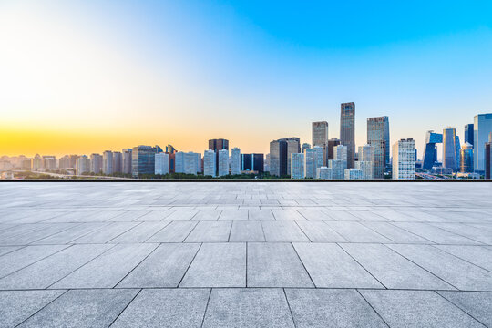 Empty square floor and modern city commercial buildings in Beijing,China. © ABCDstock