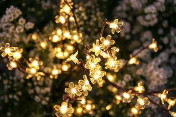 Shiny golden led lights lamp flower decoration. Night scene romantic ambience for wedding event decoration