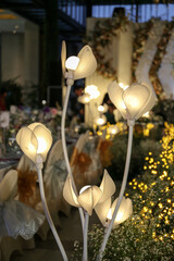 Shiny golden lights lamp flower decoration. Night scene romantic ambience for wedding event decoration