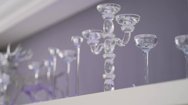 Close-up of decorative glass candlesticks in banquet hall