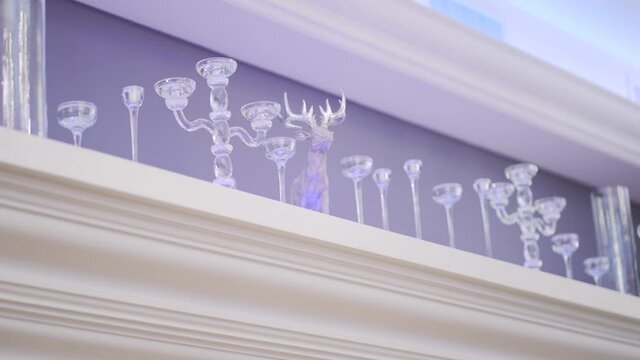 Crystal candelabrum stands in restaurant light interior closeup