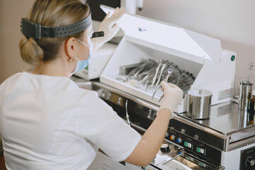 Work with cleaning systems. Ultrasonic cleaner.