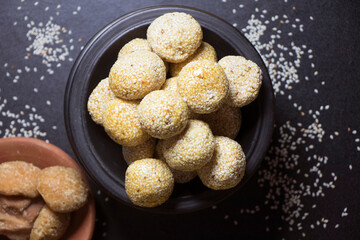 Sesame seeds mixed with jaggery sweets in shape of a solid ball also known as loddu in India