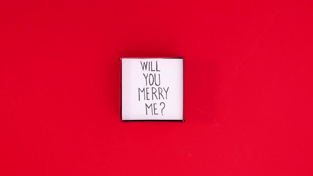 Will you merry my text in red romantic gift box that opens. marriage proposal stop motion