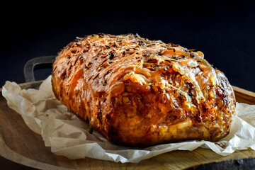 Baked meat loaf wrapped in pork caul fat for the holidays