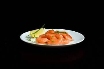 Lightly salted salmon appetizer with lemon