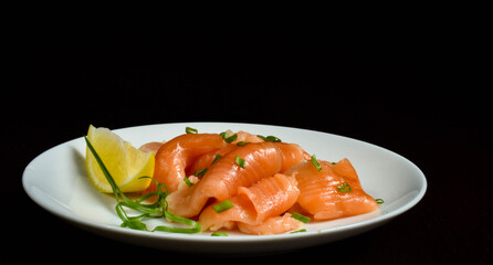 Lightly salted salmon appetizer with lemon
