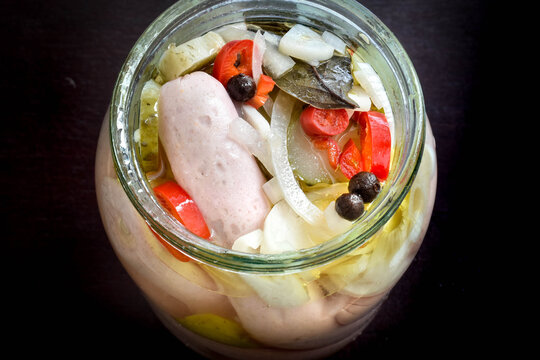 Delicious, slightly spicy, pickled sausages - a traditional meal of the Czech cold buffet.