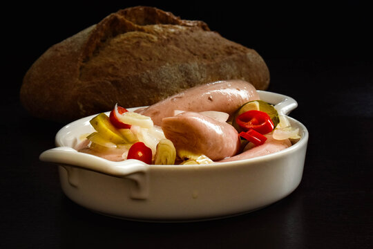 Delicious, slightly spicy, pickled sausages - a traditional meal of the Czech cold buffet.