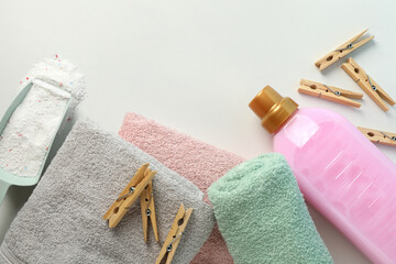 Laundry accessories on white background, top view