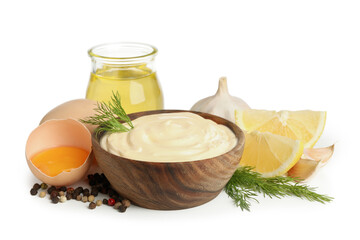 Bowl of mayonnaise and ingredients for cooking isolated on white background