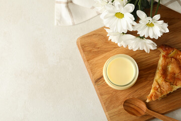 Board with pie and condensed milk, space for text