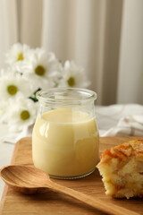 Board with pie and condensed milk, space for text