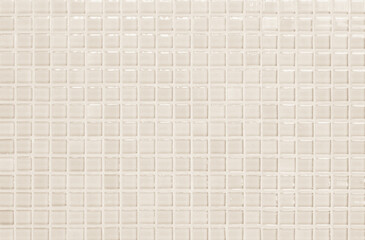 Cream pastel ceramic wall and floor tiles abstract background. Design geometric mosaic texture...