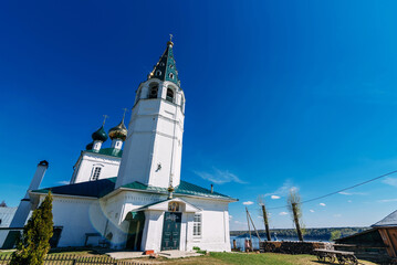 Orthodox Christian stone Church in Russia on the banks of the Volga river on a summer