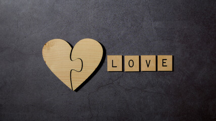 Obraz premium heart and wooden blocks with words In Love