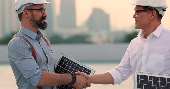 Electrical Engineer Technician and CEO executive business people making handshake after meeting. clean and green alternative energy concept.