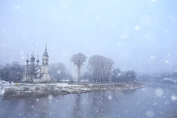 Deurstickers winter landscape church on the banks of the freezing river in vologda, christianity baptism russia christmas © kichigin19