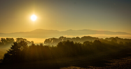 Misty sunrise over the mountains