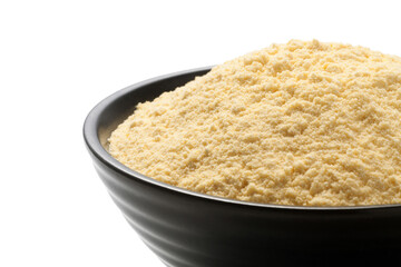Corn flour in a black bowl isolated on white background