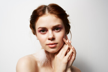 beautiful emotional woman naked shoulders clear skin freshness glamor close-up