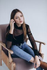 Fototapeta na wymiar Stylish girl portrait. Young caucasian pretty beautiful slim girl model isolated on white background